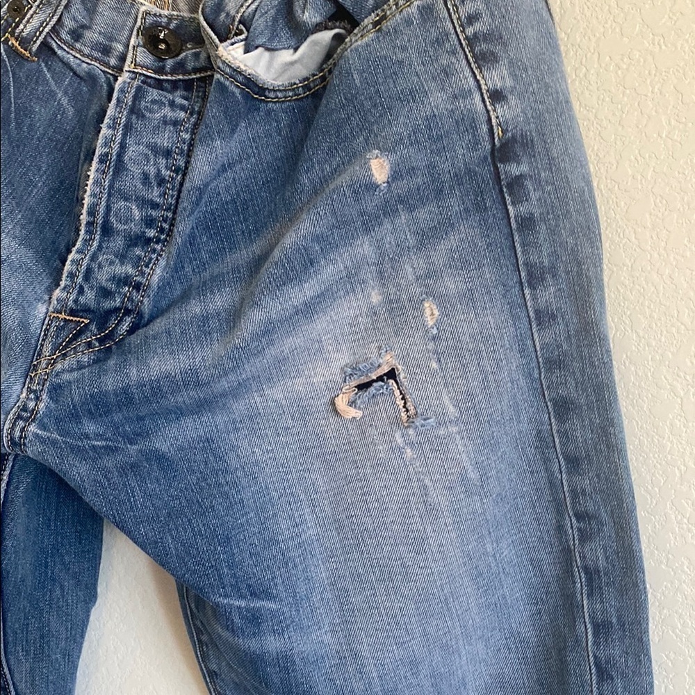 Relaxed Blue Jeans with Cropped Length and Distressed Details - Picture 6 of 10